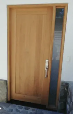 A photograph of an outside door which is made of wood from Easterwoods