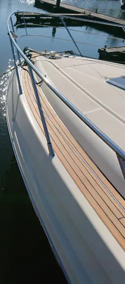 A photograph of the front of a boat that has wood from Easterwoods on it as deck