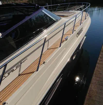 A photograph taken from the right side of a yacht with a teak deck made with wood from Easterwoods